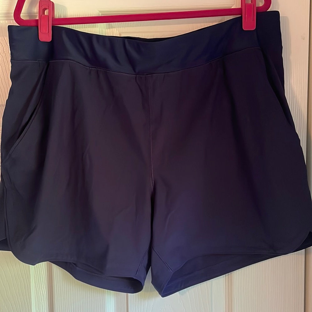 Sz 18 Lands’ End navy 5” inseam swim shorts with built in underwear and pockets.